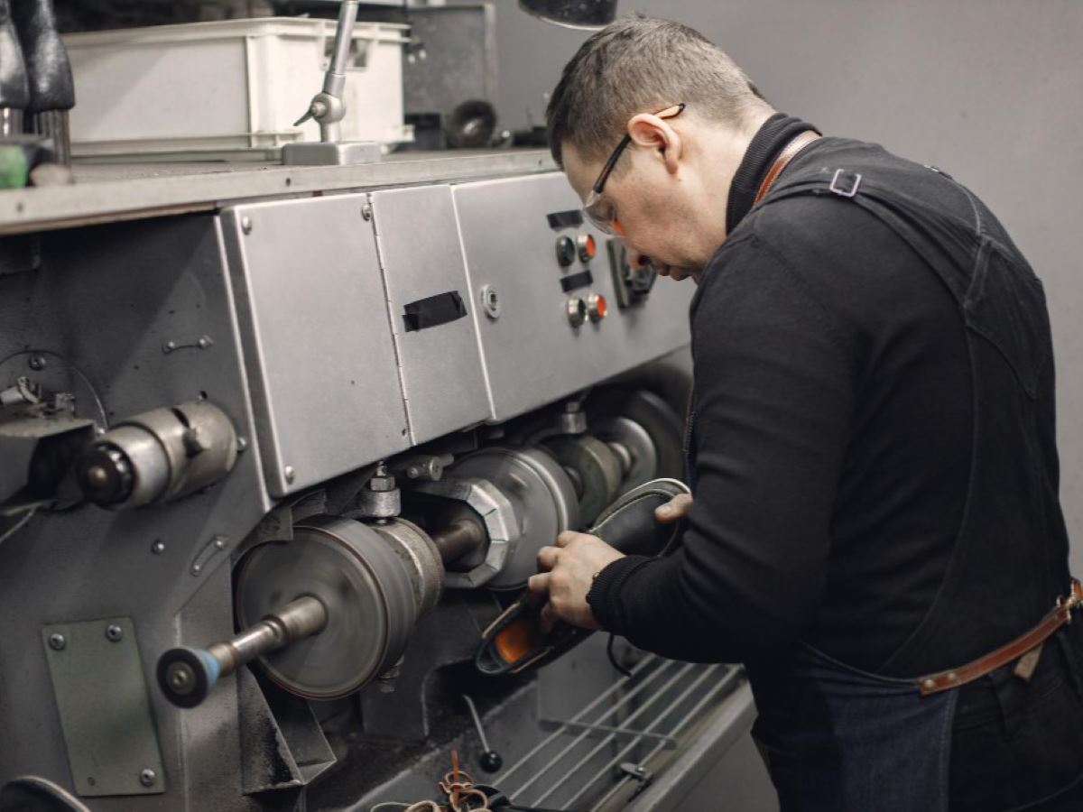 man doing equipment maintenance